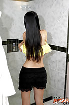 Undressing in bathroom long hair down her back